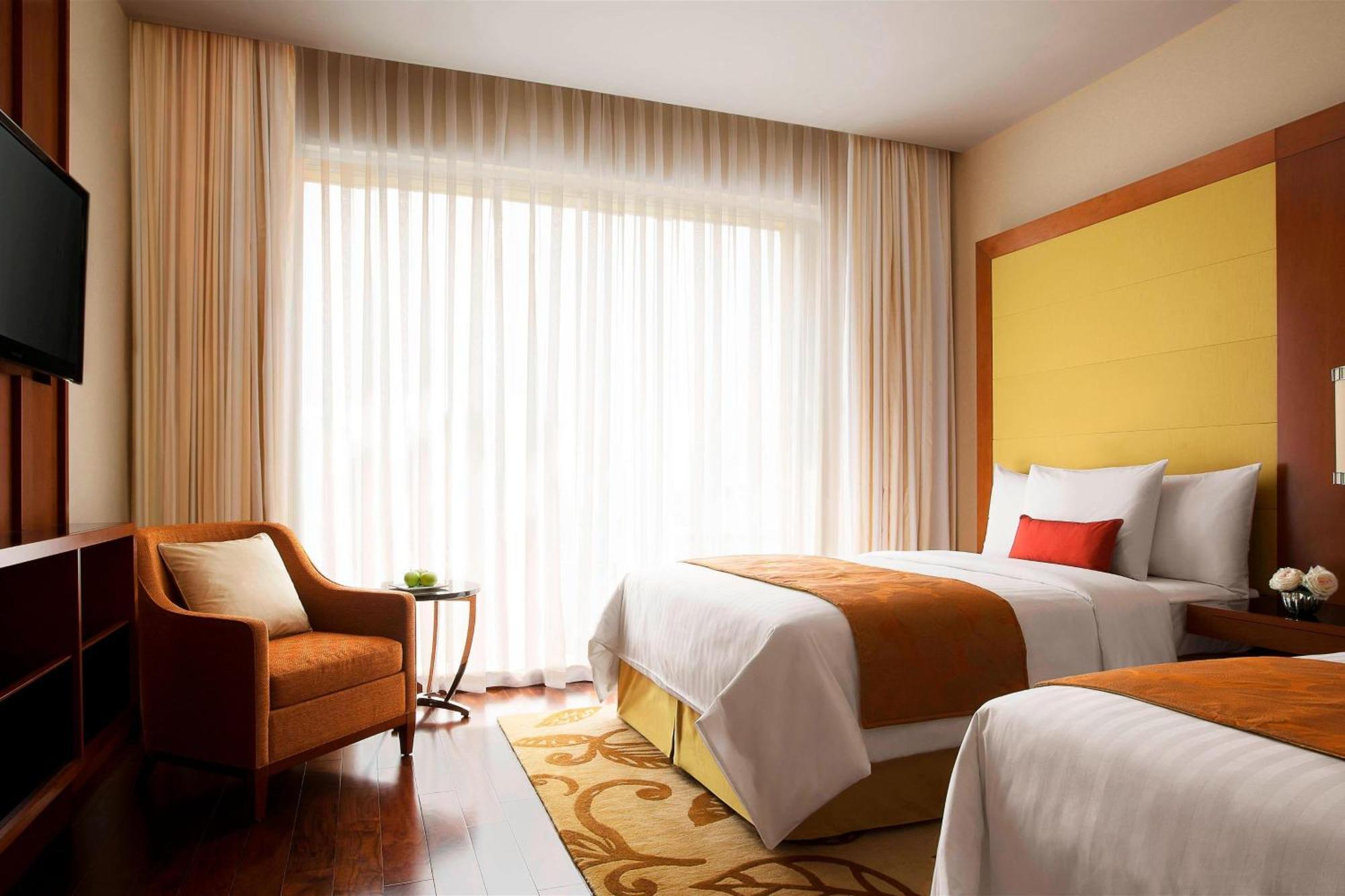 מלון נדומבסרי Courtyard By Marriott Kochi Airport מראה חיצוני תמונה A room at the hotel