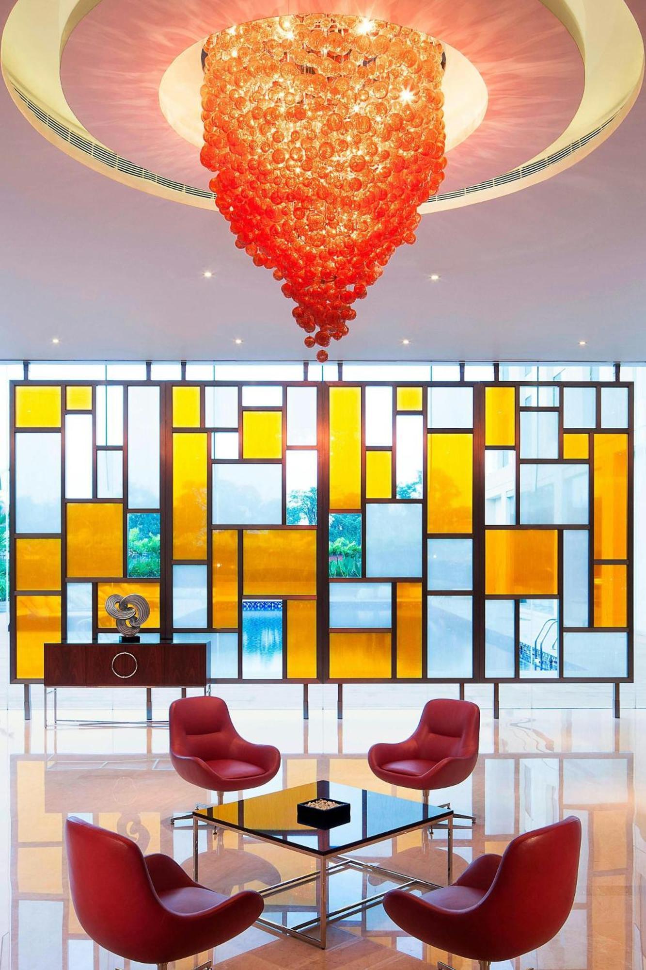 מלון נדומבסרי Courtyard By Marriott Kochi Airport מראה חיצוני תמונה A room divider