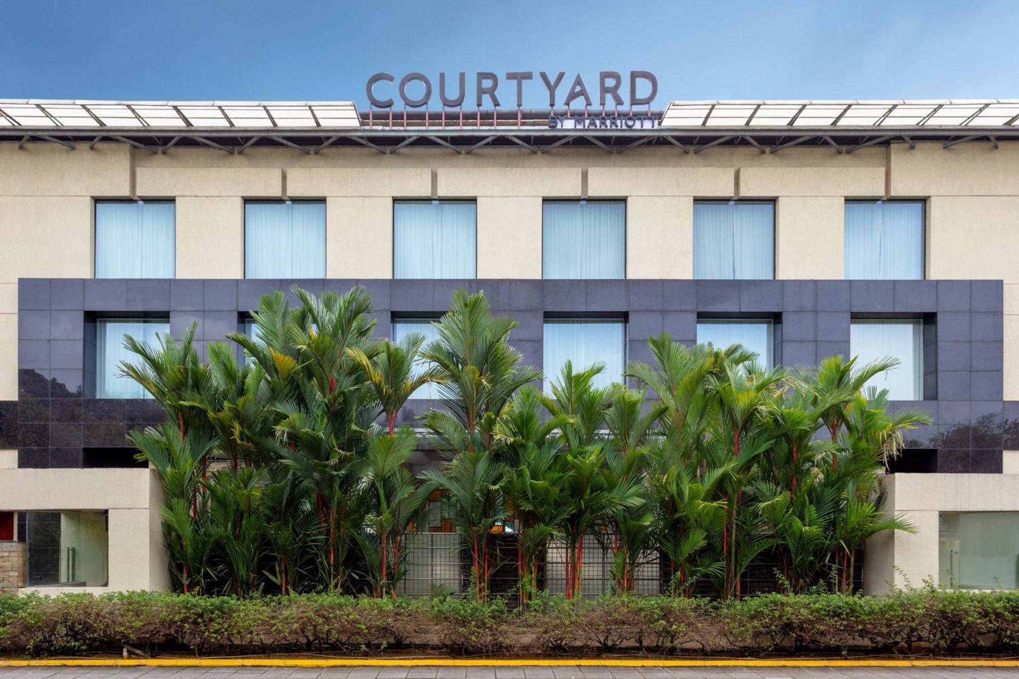 מלון נדומבסרי Courtyard By Marriott Kochi Airport מראה חיצוני תמונה Courtyard by Marriott, Bangalore