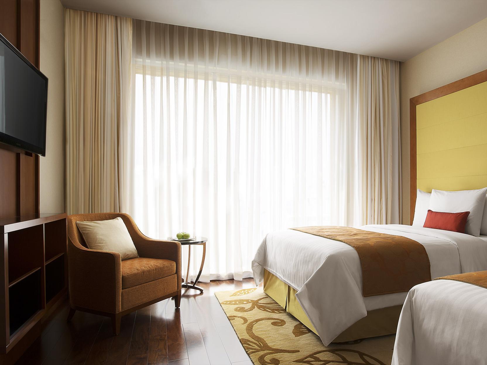מלון נדומבסרי Courtyard By Marriott Kochi Airport מראה חיצוני תמונה A room at the hotel