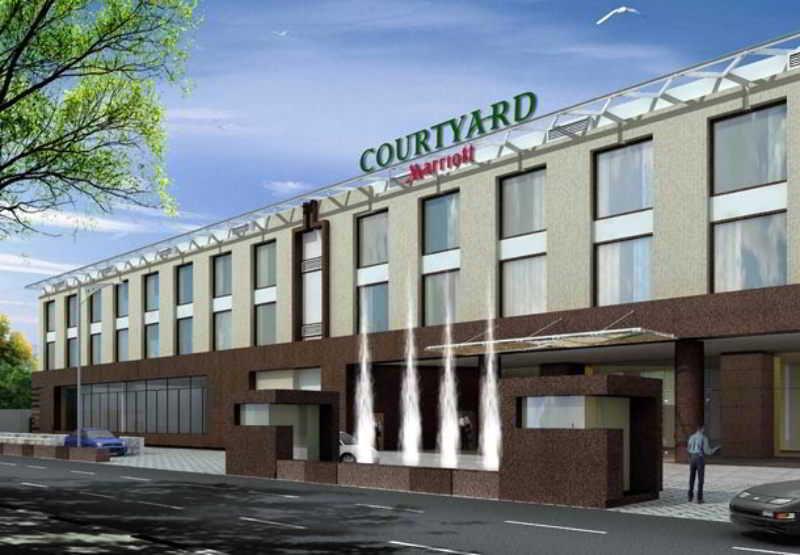 מלון נדומבסרי Courtyard By Marriott Kochi Airport מראה חיצוני תמונה Courtyard by Marriott, Bucharest