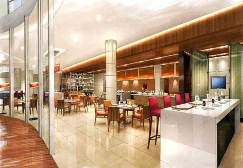 מלון נדומבסרי Courtyard By Marriott Kochi Airport מסעדה תמונה The restaurant