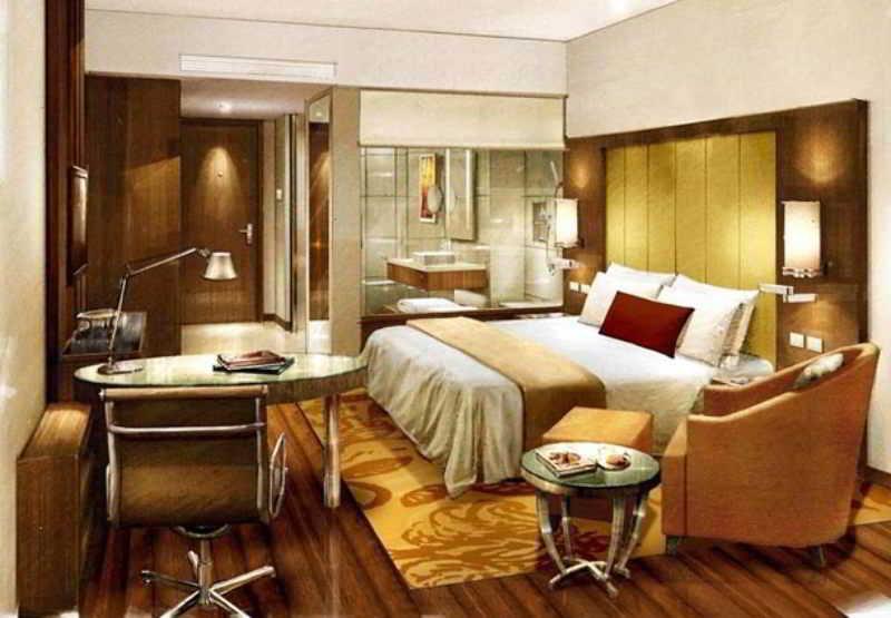 מלון נדומבסרי Courtyard By Marriott Kochi Airport חדר תמונה A room at the Taj Bengal