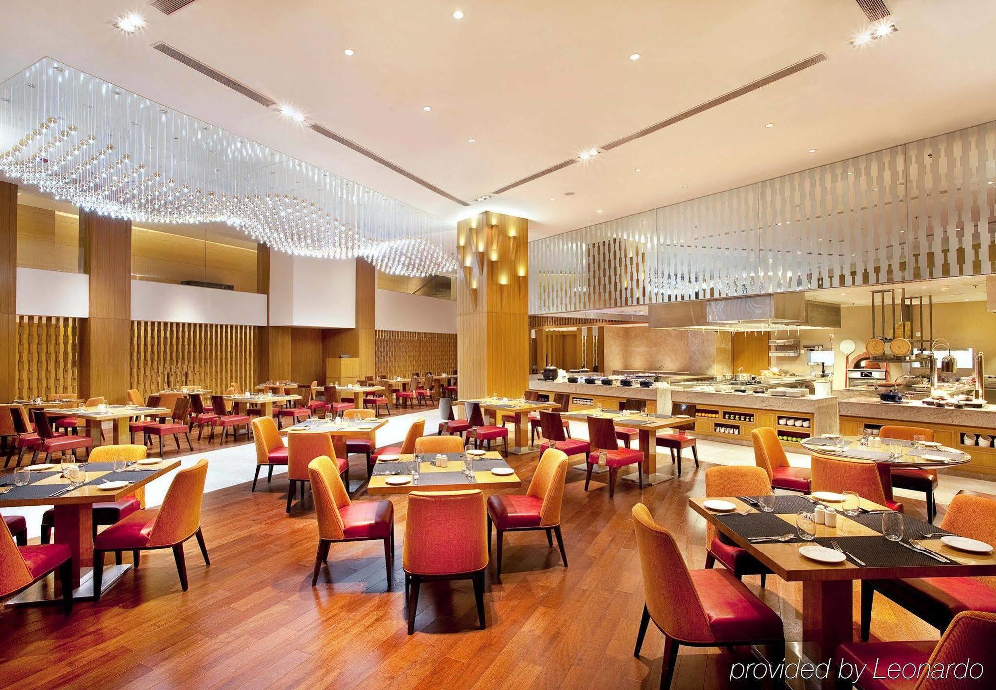מלון נדומבסרי Courtyard By Marriott Kochi Airport מראה חיצוני תמונה The restaurant